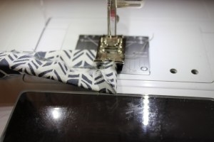 I sewed one end about a quarter inch.