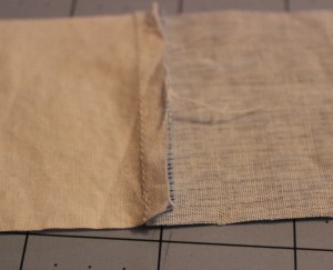 Seams pressed to the darker fabric.